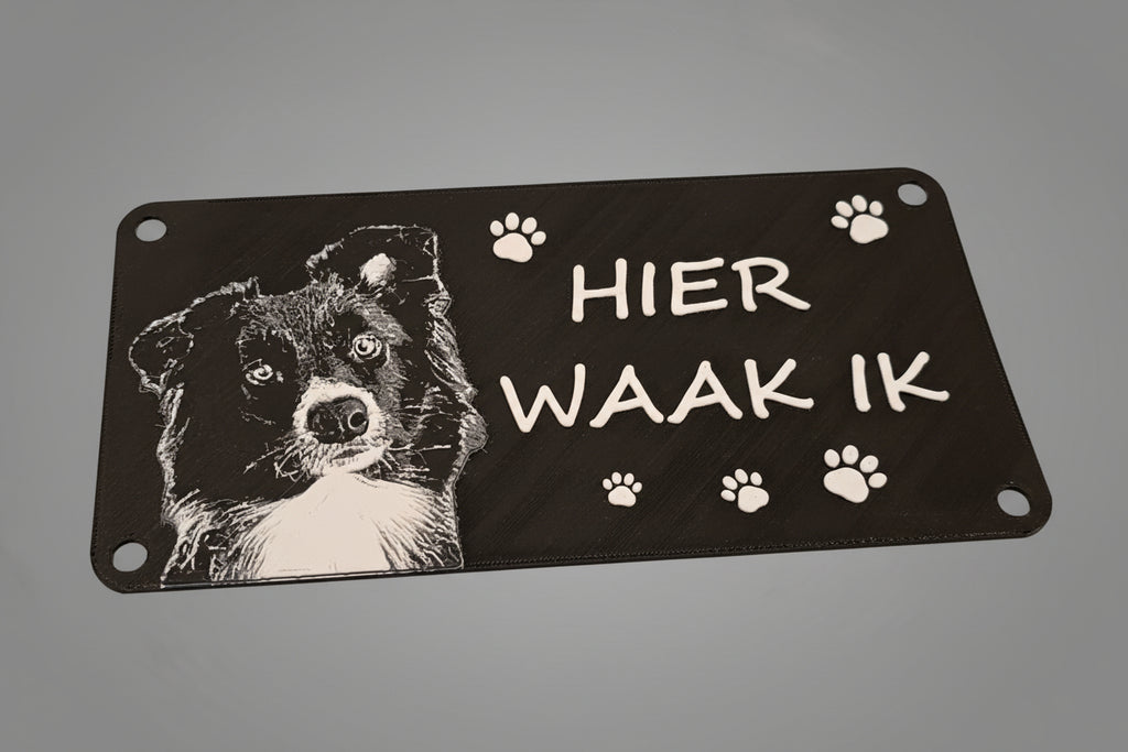 plaatje met 1 hond en de tekst Hier waak ik!